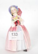 A Royal Doulton small figurine ' June ' No M65. Designer initials to base in green JW.
