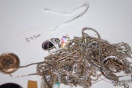 A collection of 19 silver and white metal necklaces and pendants to inlcude coin set, tigers eye,