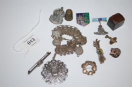 A collection of silver items along with enamel set badges to include military ,