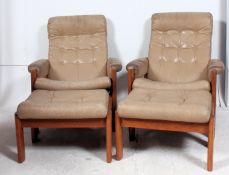 A  pair of retro 1970's Norwegian teak and cream leather armchairs by Ekornes.