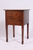 An Edwardian mahogany cased pedestal sewing box.