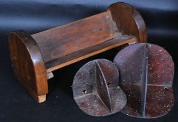 An art deco scratch built book trough along with two vintage wall brackets being made from cigar