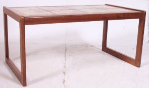 A 1970's retro teak and tile top rectangular coffee / occasional table in the manner of g-plan by