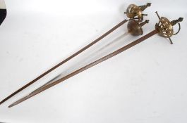 Three decorative wall hanging / dress swords of different designs please see images