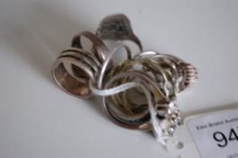 A collection of silver and white metal ladies dress rings to include one of Chinese origin.