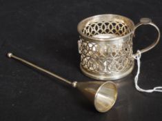 A silver hallmarked fret pierced silver chamber candlestick and holder inset together with a snuff.