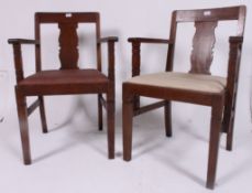 A pair of 1930's Art Deco oak cinema carver chairs.