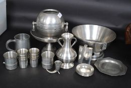 A collection of Swedish Tin / Tenn many with marks to include bowls, measures,