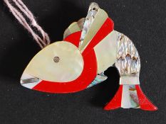 An unusual mother of pearl fish brooch