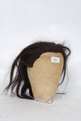 A mid 20th century Industrial tailors dummy head complete with horse hair having aluminium band