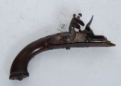 An 18th century flintlock pistol ( af) with unmarked mechanism having wooden stock ( as illustrated