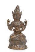 A 20th century Chinese figural study of a Tibetan three headed deity,