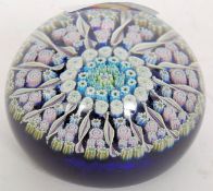 A Perthshire millefiori paperweight bearing P to the central cane complete with the sticker to