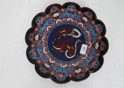 A 19th century oriental Chinese enamel cloisonne plate depicting a dragon to the centre.