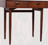A rare 1970's teak wood  Scandart two drawer desk / writing table, with beautiful grain detailing,