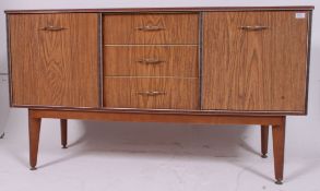 A 1950's retro faux teak wood dresser sideboard with cupboards and central bank of drawers
H78 W137