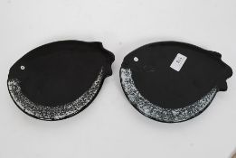 A pair of Chinese unusual oriental dishes in the form of fish bearing impressed character marks to