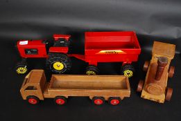 A collection of wooden toys to include train,