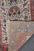A 19th century Hamadan ( Savah Area ) handmade rug having vivid colours with unusual design on