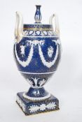 A 19th century Wedgwood urn having blue glaze with rams head,