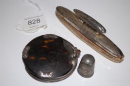 A Georgian 19th century  white metal mounted tortoise shell cased glass together with a silver