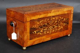 A Stunning 19th century walnut crossbanded and marquetry inlaid tea caddy raised on ball finial