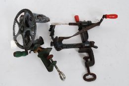 2 vintage apple corer's  / peelers one being marked for Triumpf.