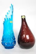 A large decorative 20th century blue glass studio art vase of unusual shape together with another.