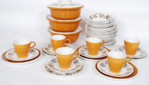 A vintage 1970's retro painted Poole Pottery part dinner / tea service comprising cups, saucers,
