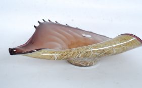 A fabulous studio art glass vase/dish in the form of a conch shell.