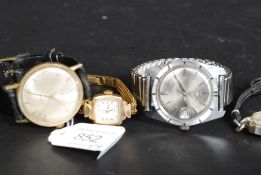 A ladies vintage Avia 9ct gold dress watch together with a silver and leather strap cocktail watch,
