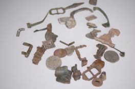 A large collection of metal detector finds to include jewellery, clips, hooks,