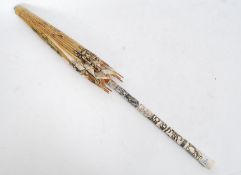 A 20th century oriental bone carved handled parasol with shibiyama  detail to the handle.