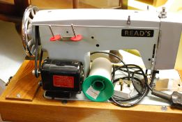 A cased portable Reads of Southampton sailmakers industrial sewing machine.