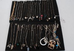 A large collection of silver 925 ladies necklaces and chains to include many pendants,