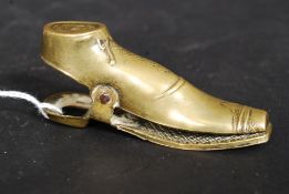 A 19th century bank note / paper clip in the form of a boot bearing Rd Lozenge to underside