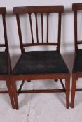 A set of 3 19th century Georgian mahogany dining chairs raised on squared supports with peripheral