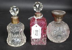 A stunning silver hallmarked and ruby cut glass ladies perfume bottle. Marked for London 1861.