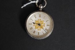 A continental silver 935 marked ladies pocket watch having gilded silver machined face with roman