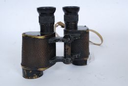 A pair of Second World War Royal Air Force binoculars, with canvas strap ,