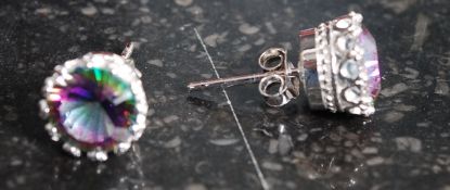 A pair of white metal silver 925 mystic topaz earrings