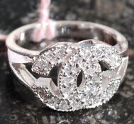 A white metal 925 Chanel style ring