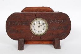 An early 20th century clock mounted in teak salvaged from the ' Herzongin Cecilie ' ship being