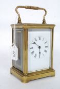 A 19th century French brass cased carriage clock having single barrel movement with escapement.