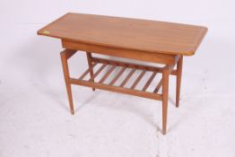 An unusual 1960's Formwood Furniture Co Special Needs adapted faux wood formica coffee table having