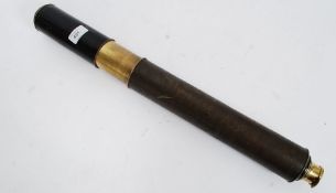 A 19th century brass and leather pull telescope
