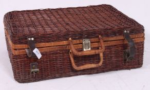 A vintage wooden  picnic hamper complete with plates cups,