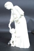 A Royal Worcester figurine of a mother and child ~ First Steps by Glenis Devereux being marked to