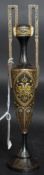 A Toledo ware steel twin handled solifleur vase of amphora style being overlaid with silver and