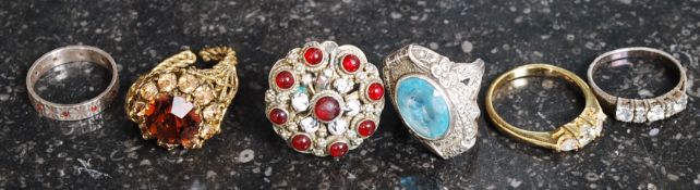 A good collection of silver and other ladies dress rings to include cornflower blue stone,